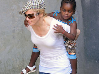 Madonna and Mercy James seen leaving the Kabbalah center,  Madonna carried Mercy on her back before heading back to her London home.