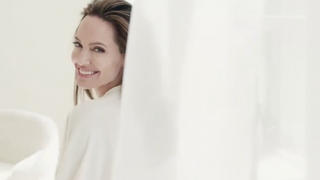 Angelina Jolie stuns in her new "Mon Guerlain" fragrance campaign for French beauty brand Guerlain.The label shared a video on social media called "Notes of a Woman", showing Jolie stripping off an ivory robe in a mansion and dancing through a vineyard.