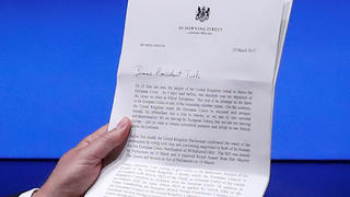 European Council President Donald Tusk shows British Prime Minister Theresa May's Brexit letter in notice of the UK's intention to leave the bloc under Article 50 of the EU's Lisbon Treaty, at the end of a news conference in Brussels, Belgium March 29, 2017. REUTERS/Yves Herman     TPX IMAGES OF THE DAY