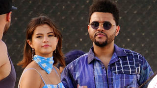 Selena Gomez makes out with The Weeknd as they shared in sights of the Coachella Festival in Indio, CA. Selena and The Weeknd takes turns eating chips as they watched performers on stage. The Weeknd is a performer at the festivalThe Weeknd has arm around his honey Selena Gomez as they shared in sights of the Coachella Festival in Indio, CA. Selena and The Weeknd takes turns eating chips as they watched performers on stage.