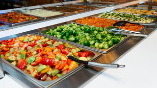 Vegetables and other foods in free-flo restaurant