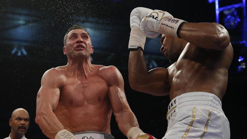 Britain Boxing - Anthony Joshua v Wladimir Klitschko IBF, IBO & WBA Super World Heavyweight Title s - Wembley Stadium, London, England - 29/4/17 Anthony Joshua in action with Wladimir Klitschko BOXE : Anthony Joshua vs Wladimir Klitschko - Wembley -