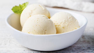 Vanilla Ice Cream with Mint in bowl Organic productVanilla Ice Cream with Mint in bowl Organic productVanilla Ice Cream with Mint in bowl Organic product