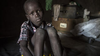 Deng*, seven, at his grandmothers home in Waat, Jonglei state, South Sudan. Deng was separated from his mother when violence broke out in December 2013.Save the Children works with UNICEF and more than twenty NGO partners to register separated children, locate their families and bring them back togetherFamily Tracing and Reunification (FTR) is an important component of protecting children in South Sudan from violence, abuse, neglect and exploitation.