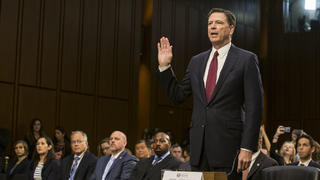 Former FBI Director James Comey offers testimony to the Senate Intelligence Committee about his conversations with President Trump concerning Trump's ties to Russia on Capitol Hill in Washington, D.C.