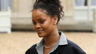 Rihanna is received by French President Emmanuel Macron and his wife Brigitte Macron on behalf of her charity at Elysee Palace in Paris, France.