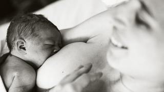 Breastfeeding her newborn