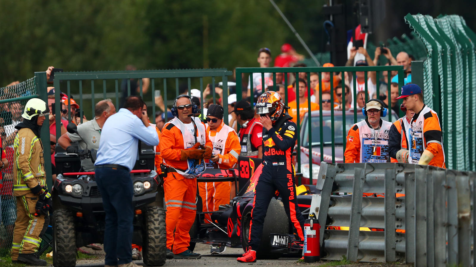 SPA, BELGIUM - AUGUST 27: Max Verstappen of Netherlands and Red Bull Racing walks from his car after retiring during the Formula One Grand Prix of Belgium at Circuit de Spa-Francorchamps on August 27, 2017 in Spa, Belgium.  (Photo by Dan Istitene/Get