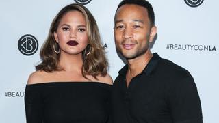 Chrissy Teigen and husband John Legend arrive at the 5th Annual Beautycon Festival Los Angeles - Day 2 at the at Los Angeles Convention Center on August 13, 2017 in Los Angeles, California.