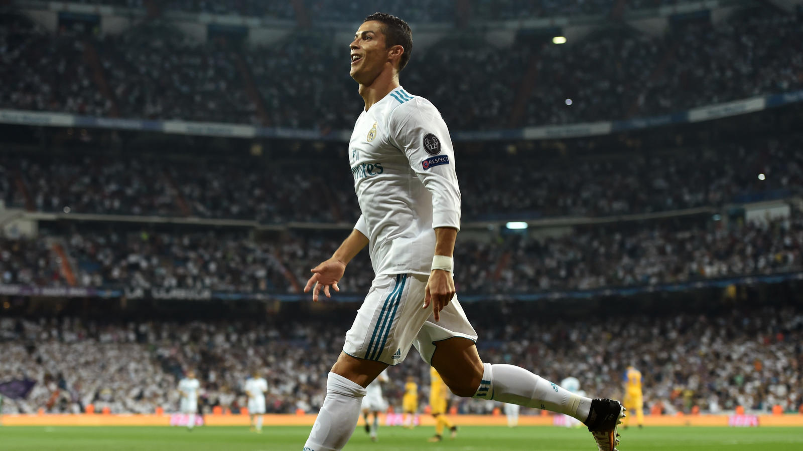 MADRID, SPAIN - SEPTEMBER 13: Cristiano Ronaldo of Real Madrid celebrates scoring his sides first goal during the UEFA Champions League group H match between Real Madrid and APOEL Nikosia at Estadio Santiago Bernabeu on September 13, 2017 in Madrid, 
