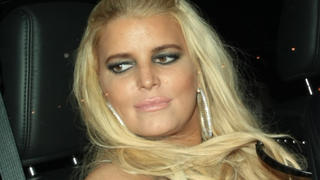Jessica Simpson almost slipped as she and husband Eric Johnson left Craig's swarmed by photographers , in West Hollywood, CA
