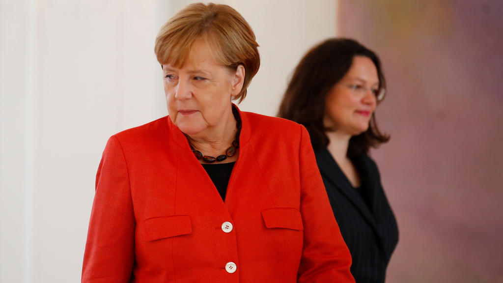 German Chancellor Angela Merkel and outgoing Labour Minister Andrea Nahles arrive at Bellevue Castle in Berlin September 28, 2017. REUTERS/Axel Schmidt