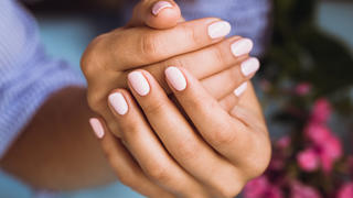 Beautiful woman's nails with beautiful pink manicure