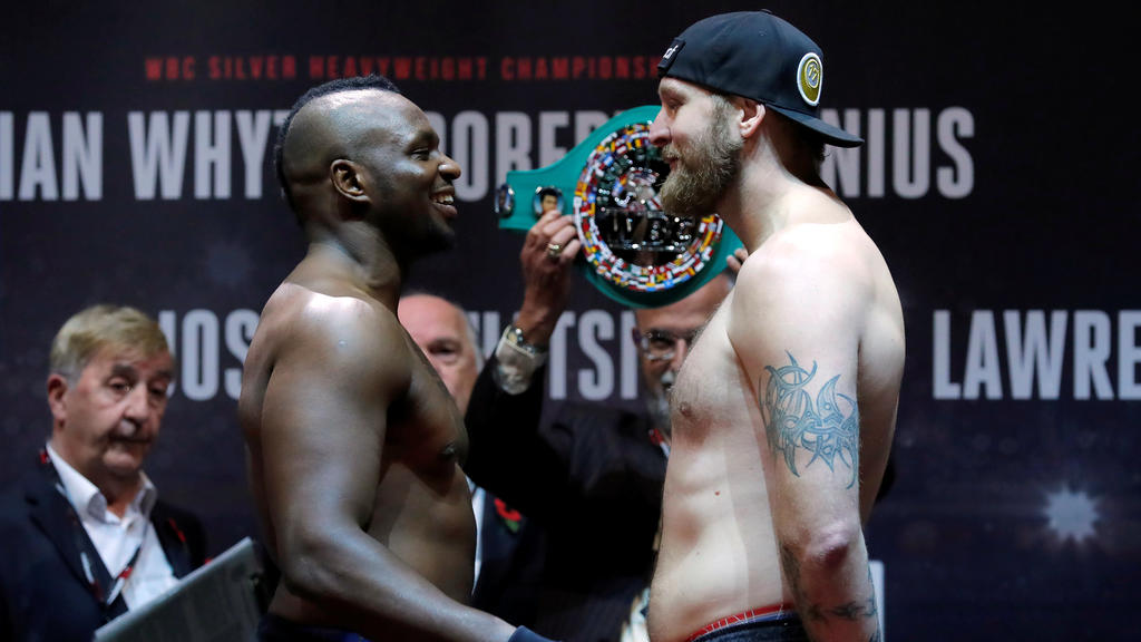 Boxing - Anthony Joshua & Carlos Takam Weigh-In - Motorpoint Arena, Cardiff, Britain - October 27, 2017 Dillian Whyte and Robert Helenius go head-to-head during the weigh-in Action Images via Reuters/Andrew Couldridge