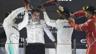 Yas Marina Circuit, Abu Dhabi, United Arab Emirates. Sunday 26 November 2017. Lewis Hamilton, Mercedes AMG, 2nd Position, Valtteri Bottas, Mercedes AMG, 1st Position, and Sebastian Vettel, Ferrari, 3rd Position, celebrate on the podium. World SNE13332 PUBLICATIONxINxGERxSUIxAUTxHUNxONLY  
