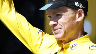 epa04841132 Team Sky rider Christopher Froome of Britain reacts on the podium wearing the overall leader's yellow jersey following the 7th stage of the 102nd edition of the Tour de France 2015 cycling race over 190.5km between Livarot and Fougeres, France, 10 July 2015. EPA/KIM LUDBROOK +++(c) dpa - Bildfunk+++