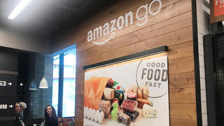 Signage is seen inside Amazonâ€™s first cash register-free grocery store, in Seattle, Washington, U.S., January 18, 2018. Photo taken January 18, 2018.   REUTERS/Jeffrey Dastin