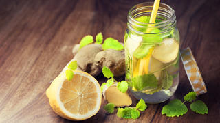 Infused water for detoxing your body with lemons, spearmint, melissa and ginger