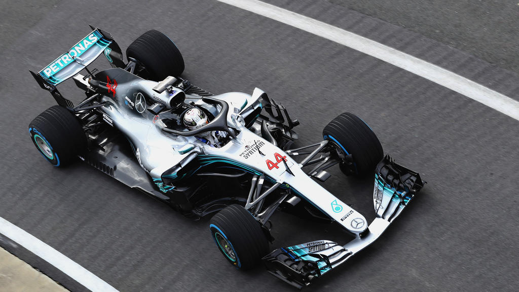 NORTHAMPTON, ENGLAND - FEBRUARY 22: Lewis Hamilton of Great Britain and Mercedes GP driving the Mercedes W09 on track during the launch of the Mercedes Formula One team's 2018 car, the W09, at Silverstone Circuit on February 22, 2018 in Northampton,