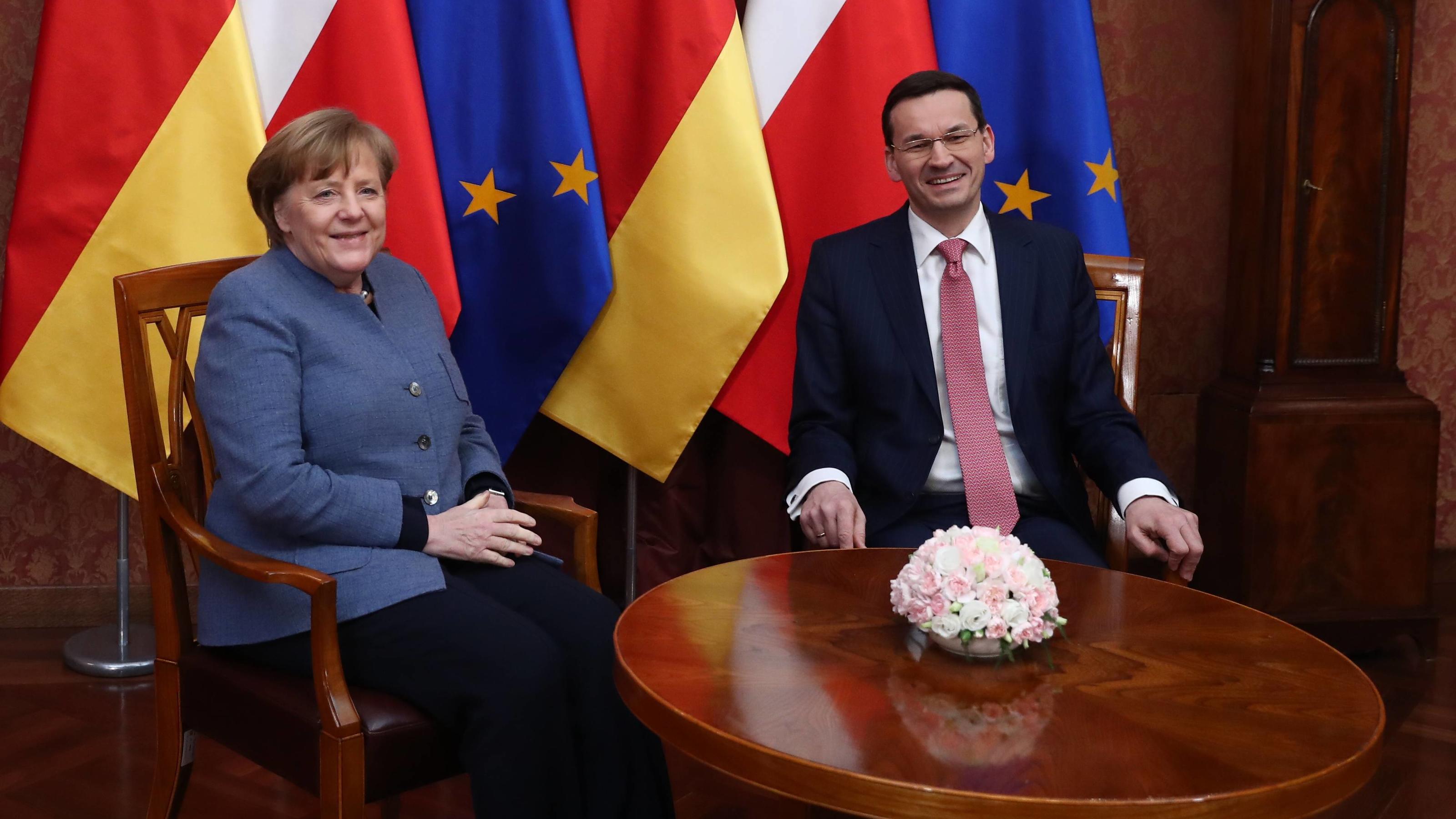 Angela Merkel in Poland German Chancellor Angela Merkel is received by Poland s Prime Minister Mateusz Morawiecki on March 19, 2018 during her visit to Warsaw, Poland. EN_01310563_0049 PUBLICATIONxINxGERxSUIxAUTxONLY  