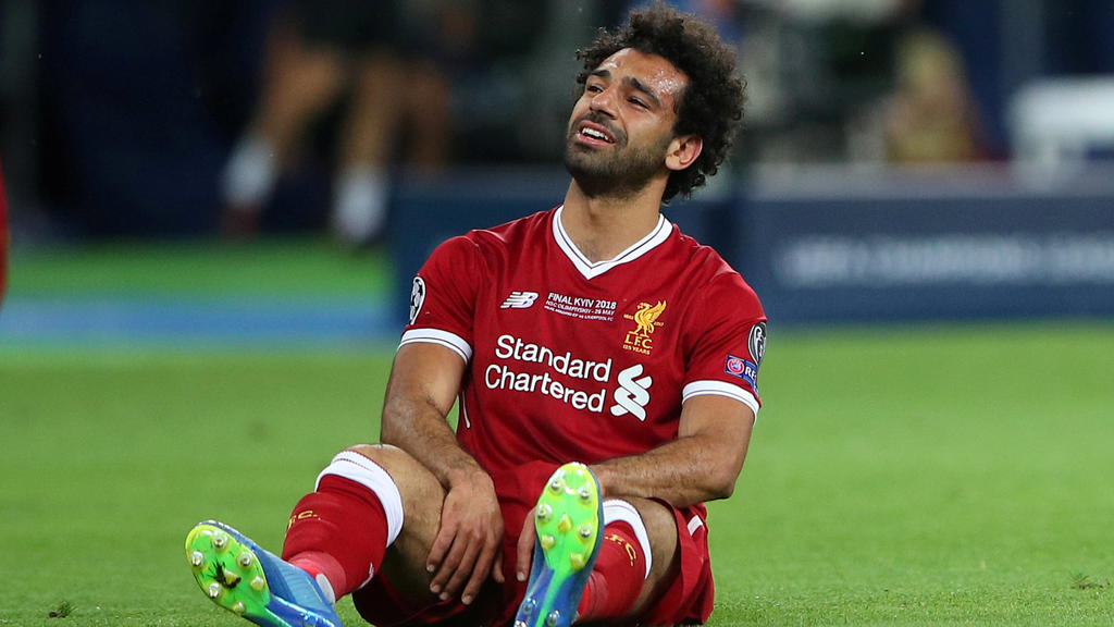 Soccer Football - Champions League Final - Real Madrid v Liverpool - NSC Olympic Stadium, Kiev, Ukraine - May 26, 2018   Liverpool's Mohamed Salah looks dejected after sustaining an injury   REUTERS/Hannah McKay     TPX IMAGES OF THE DAY