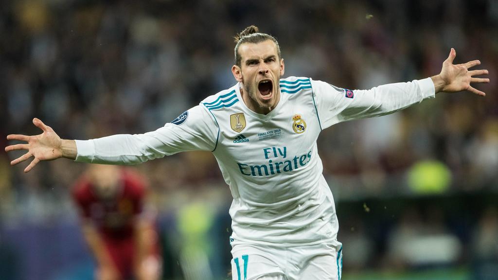 (180527) -- KIEV, May 27, 2018 -- Gareth Bale of Real Madrid celebrates scoring during the UEFA Champions League final match between Liverpool and Real Madrid in Kiev, Ukraine on May 26, 2018. Real Madrid claimed the title with 3-1. ) (SP)UKRAINE-KIE