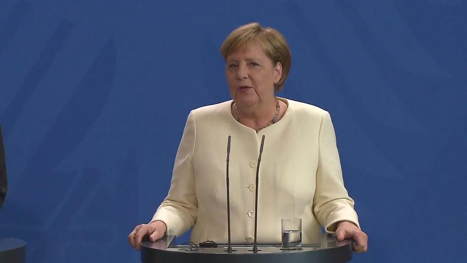 Das sagt die Kanzlerin über ihre Gesundheit Merkel sitzt bei Staatsempfang