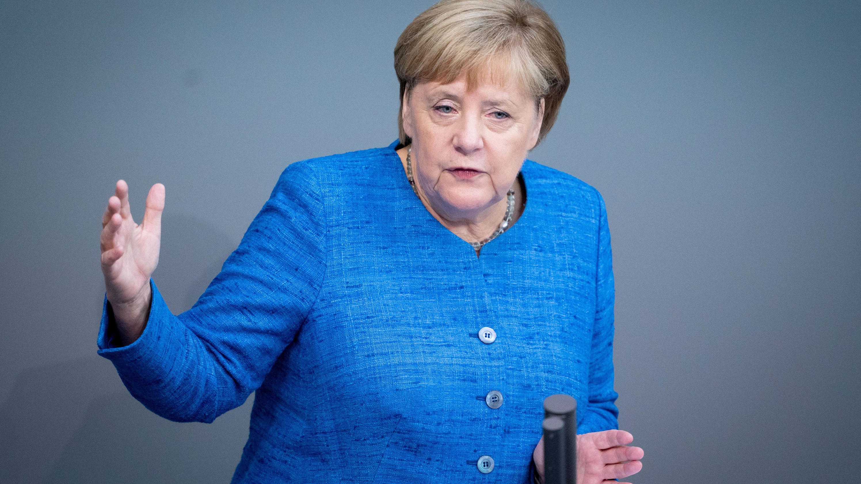 Merkel: Klimaschutz wird Geld kosten Heftiger Klima-Zoff im Bundestag