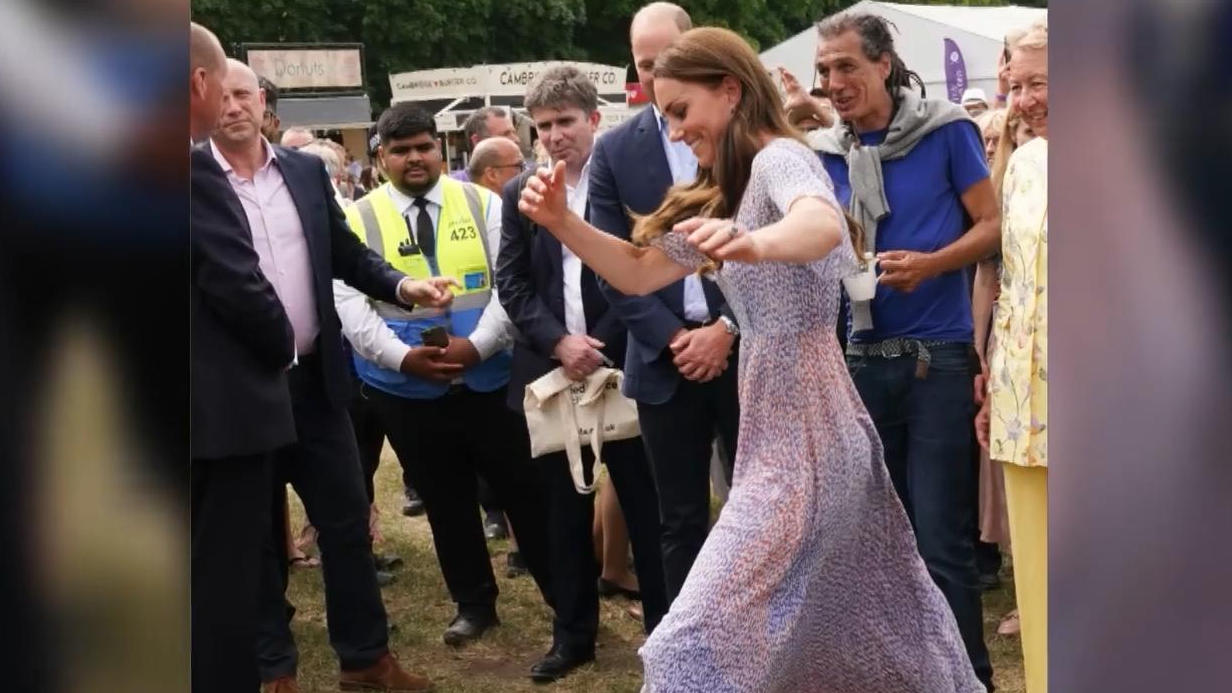 Duchess Kate plays football with high heels beer & football with the royals