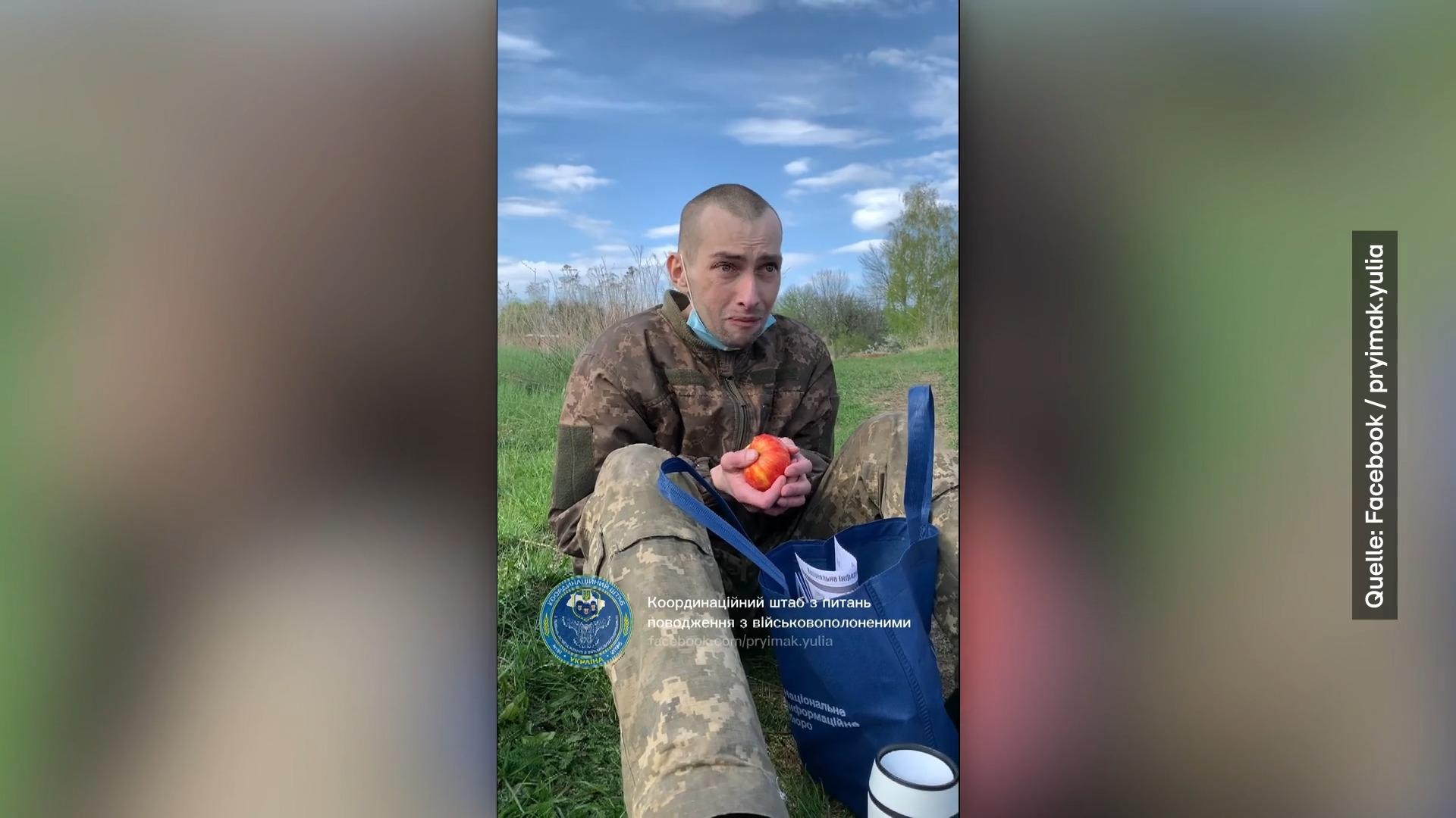 Ukrainische Soldaten weinen vor Freude Zurück aus dem Krieg