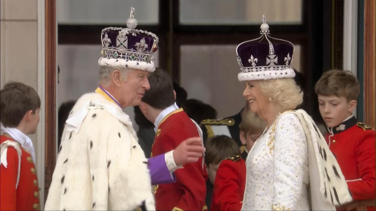 Charles and Camilla once again wave to fans on the balcony at the Royal encore